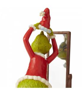 Grinch Getting Dressed in Santa Suit